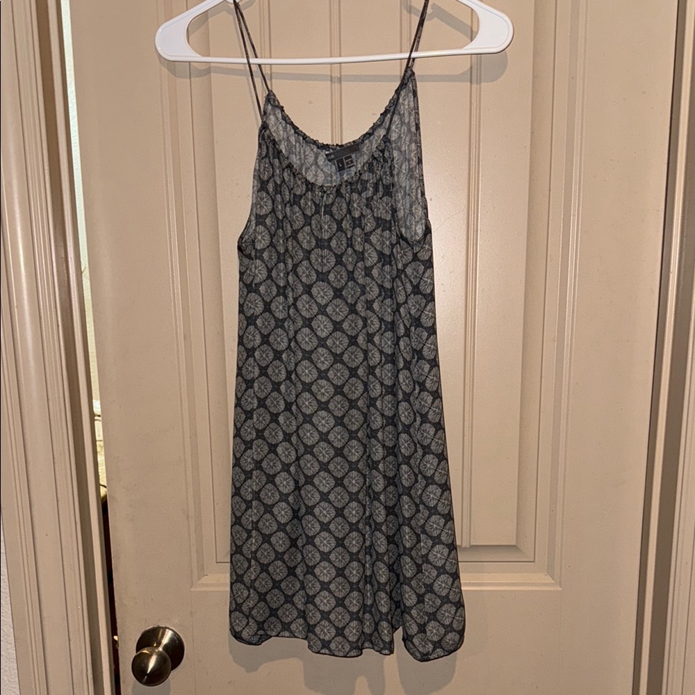 Sleeveless silk tank top, excellent condition, feels smooth & soft.